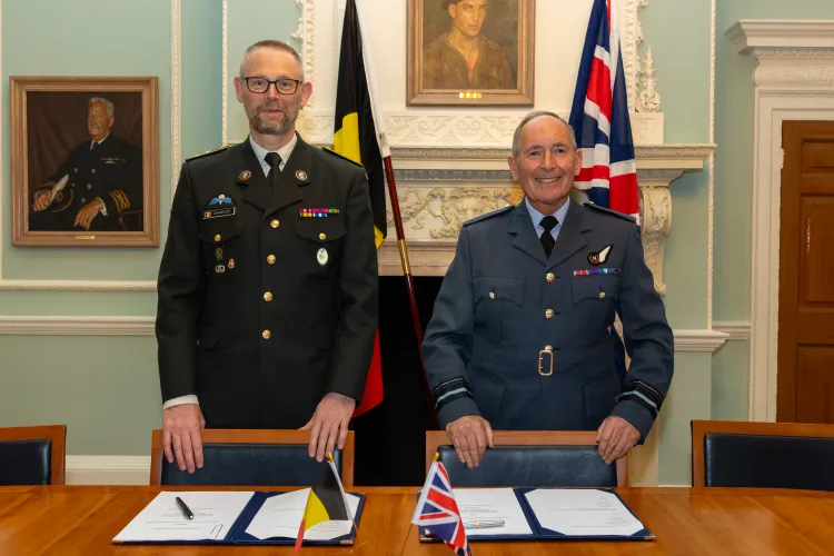 The signing of the Memorandum of Understanding, left to right: Major-General Pierre Ciparisse and Air Vice-Marshall Nigel Maddox, Defence Exports, Ministry of Defenc